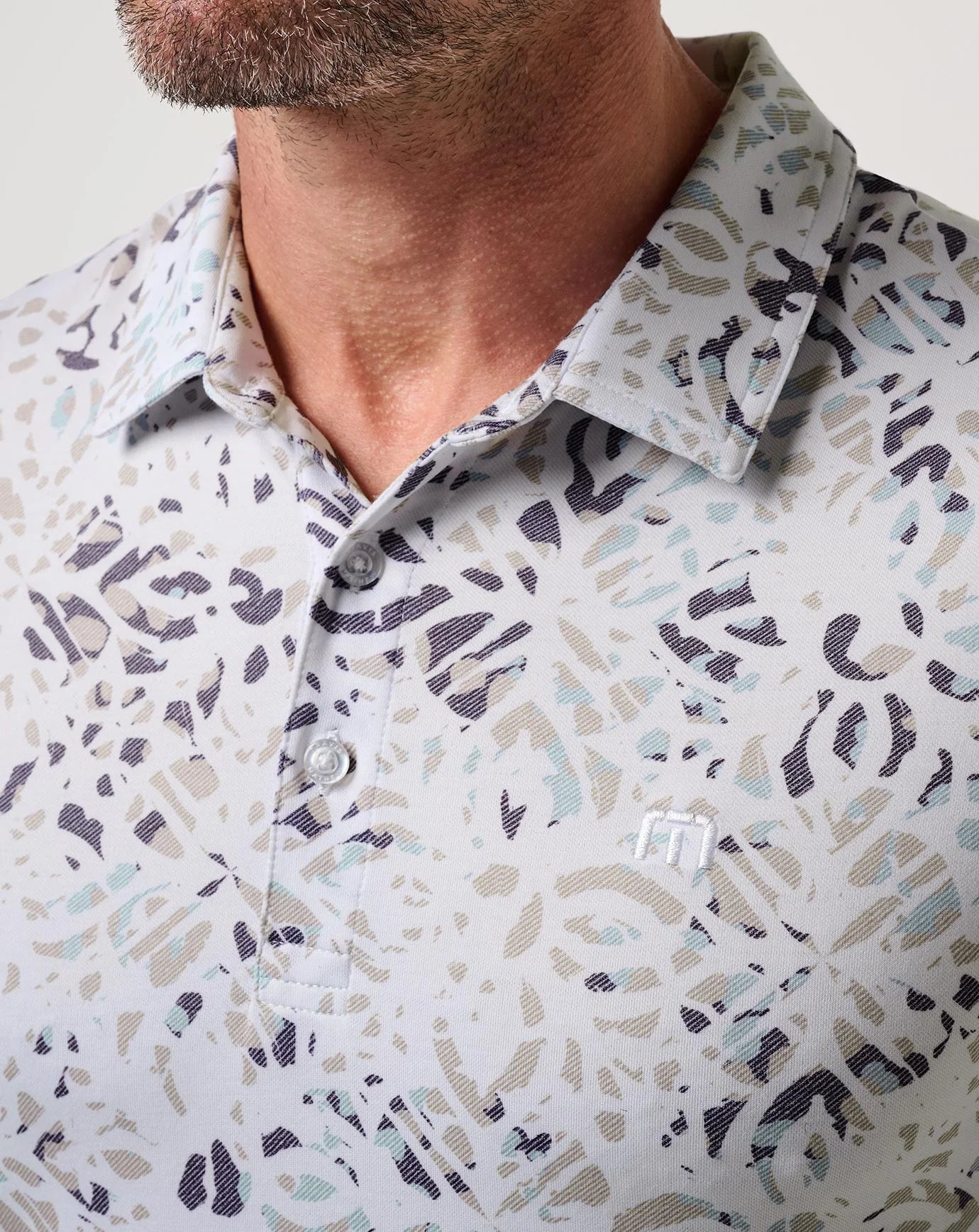 detail collar on the TravisMathew Featherweight Chill Polo Shirt