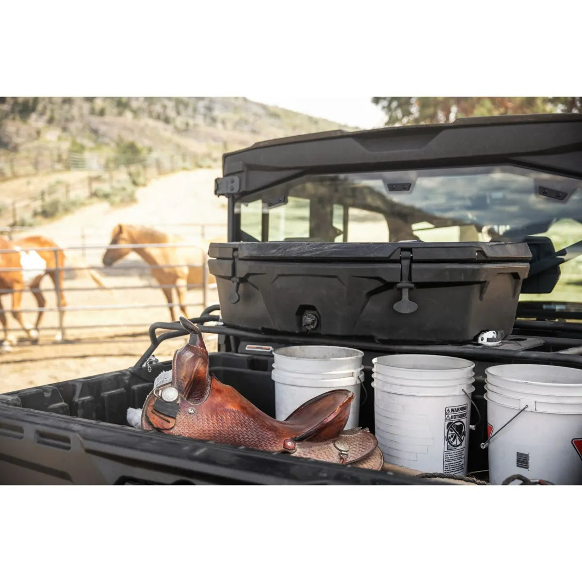 Can-Am LinQ Cargo Box - 45 L is installed on the back of a SxS