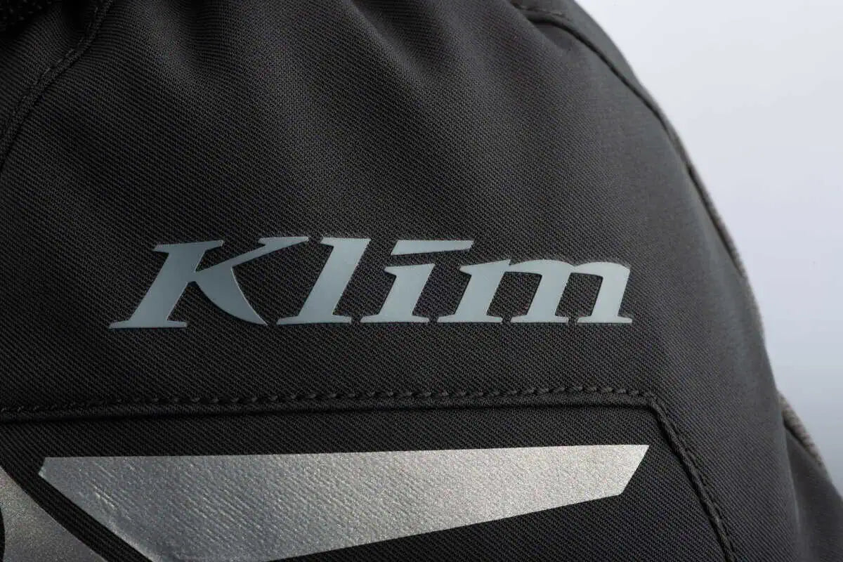 logo detail on the Klim Klimate eFire Gauntlet Glove