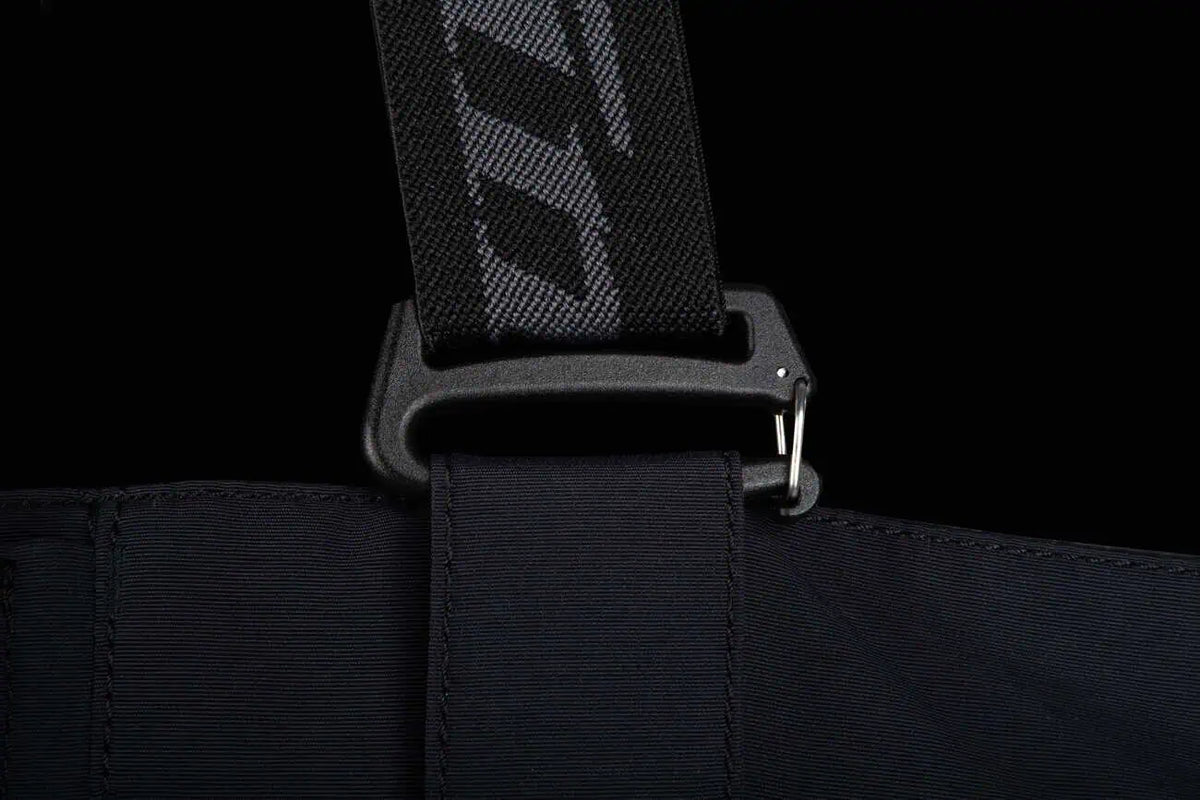 strap detail on Bitter Chocolate - Black Klim PowerXross Pant