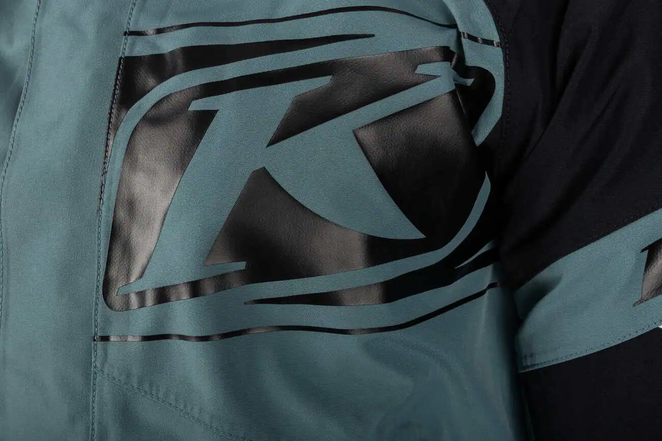 klim logo on the Klim Terrain One-Piece Monosuit