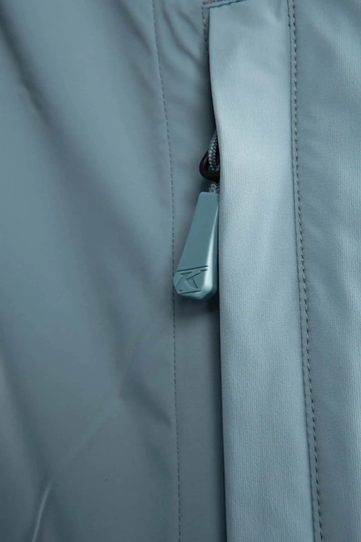 view of goblin blue - petrol color of the Klim Torque Jacket