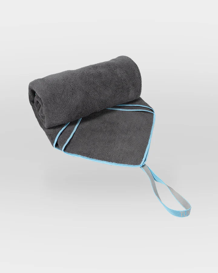 Gray towel with a blue trim on a white background