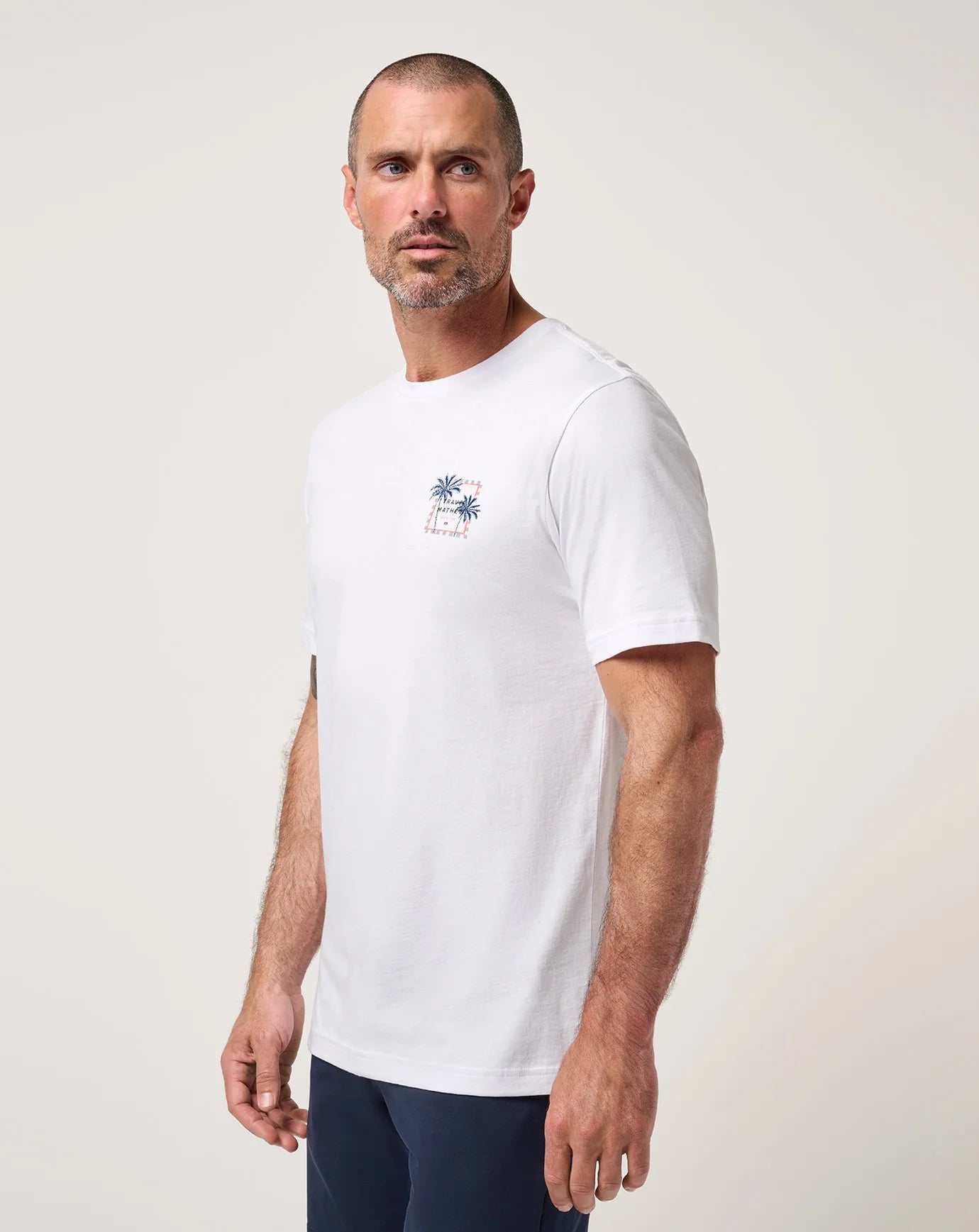 Man wearing a TravisMathew Beach Resort T-Shirt