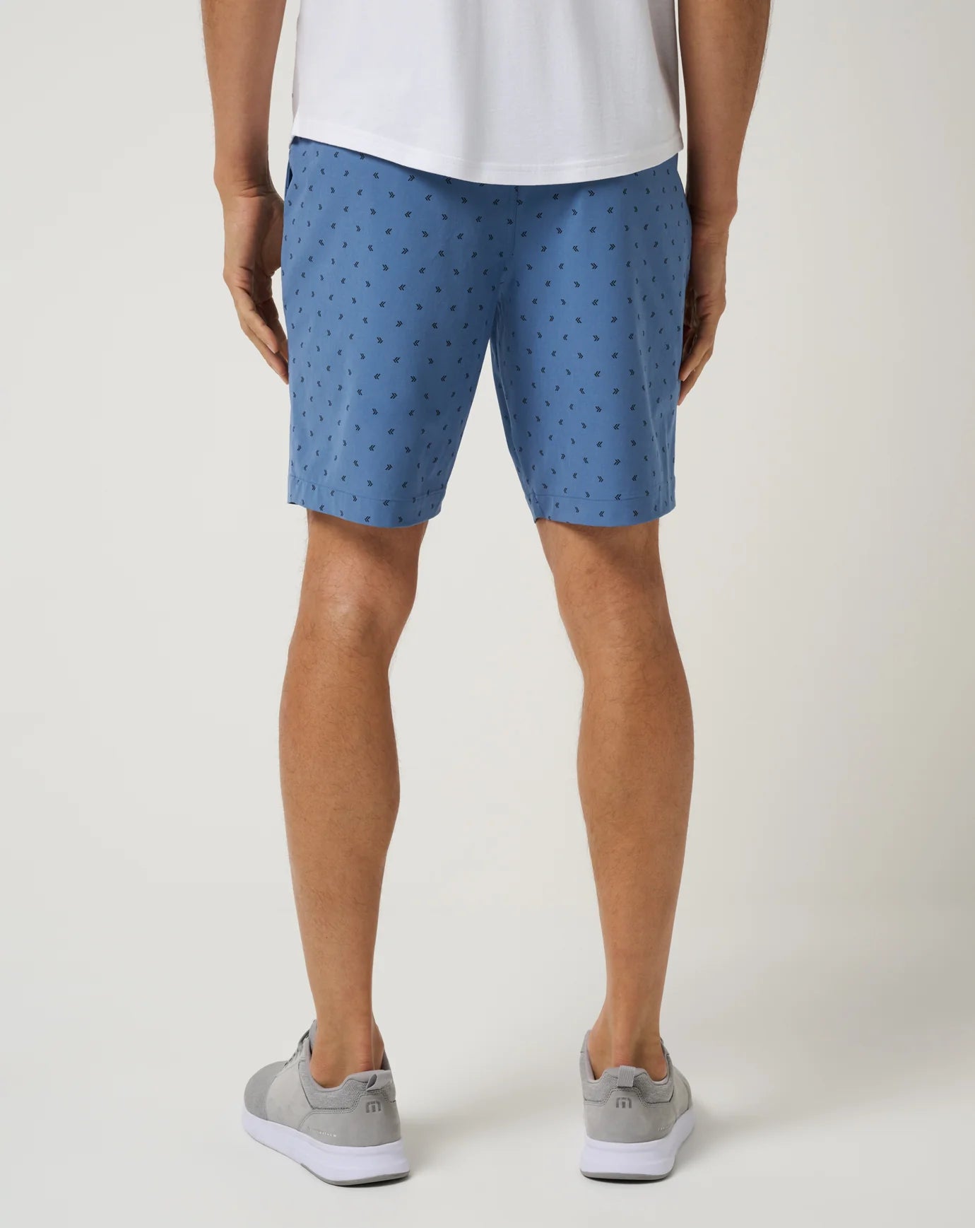 a man wearing the TravisMathew Beck Print Shorts, back view of the shorts