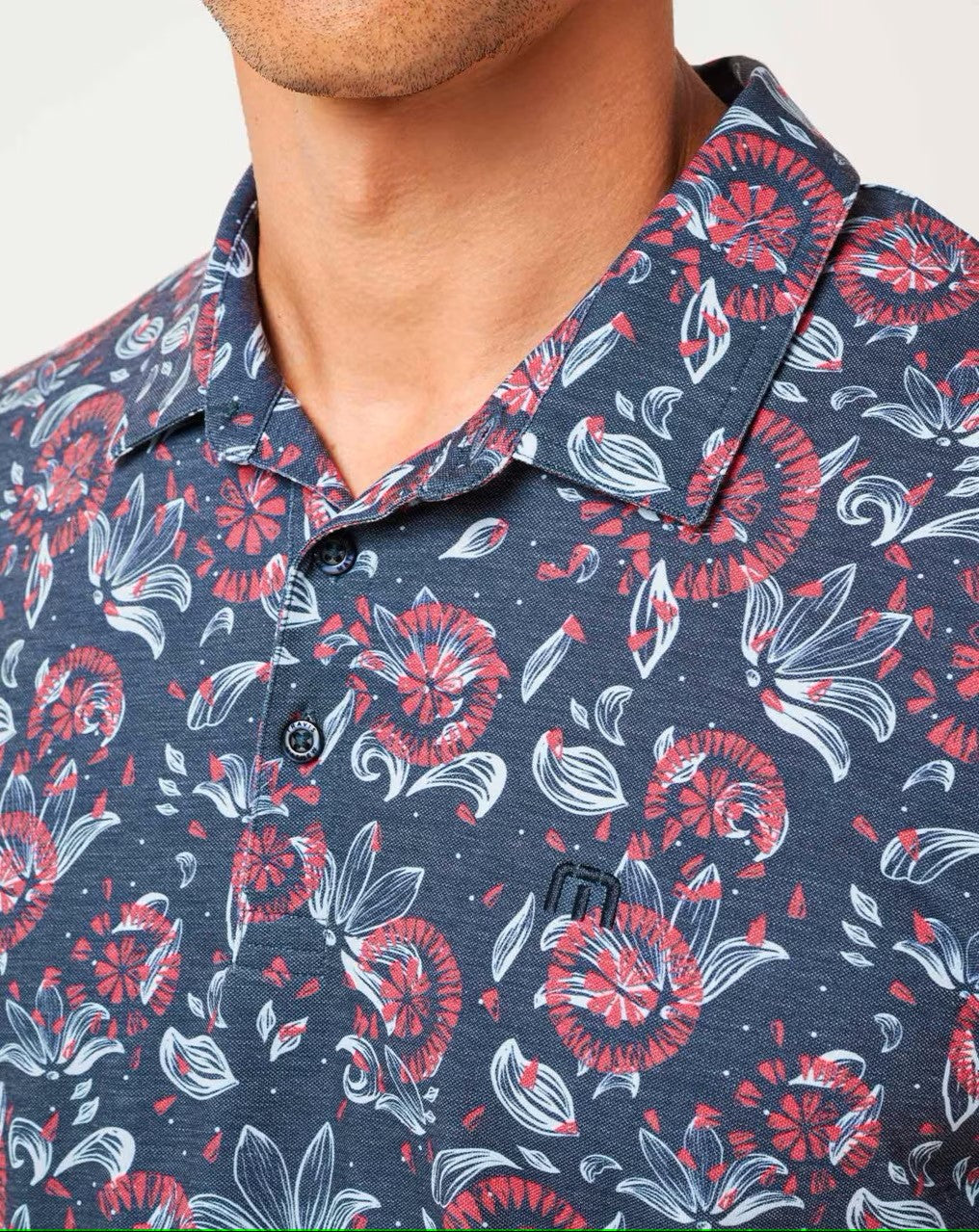 collar detail on the TravisMathew Featherweight Flourish Polo Shirt