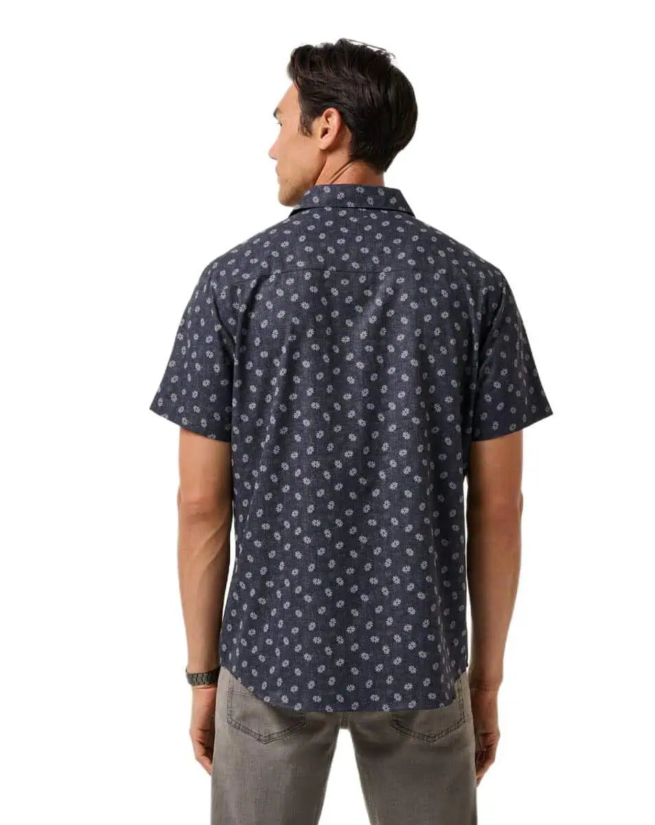 back view of the TravisMathew Grey Wind Woven Shirt