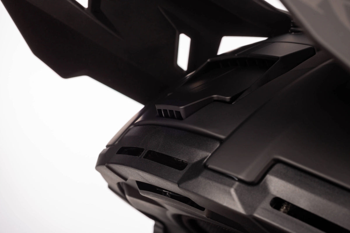 solid matte black Klim T1 Freeride ECE Youth Snowmobile Helmet