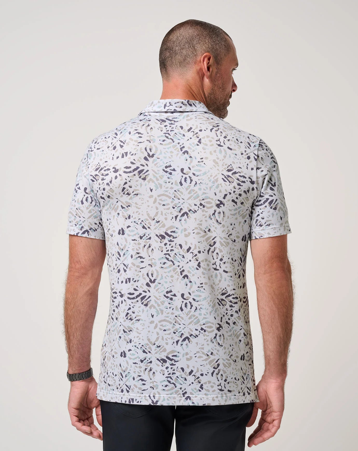 back view of TravisMathew Featherweight Chill Polo Shirt