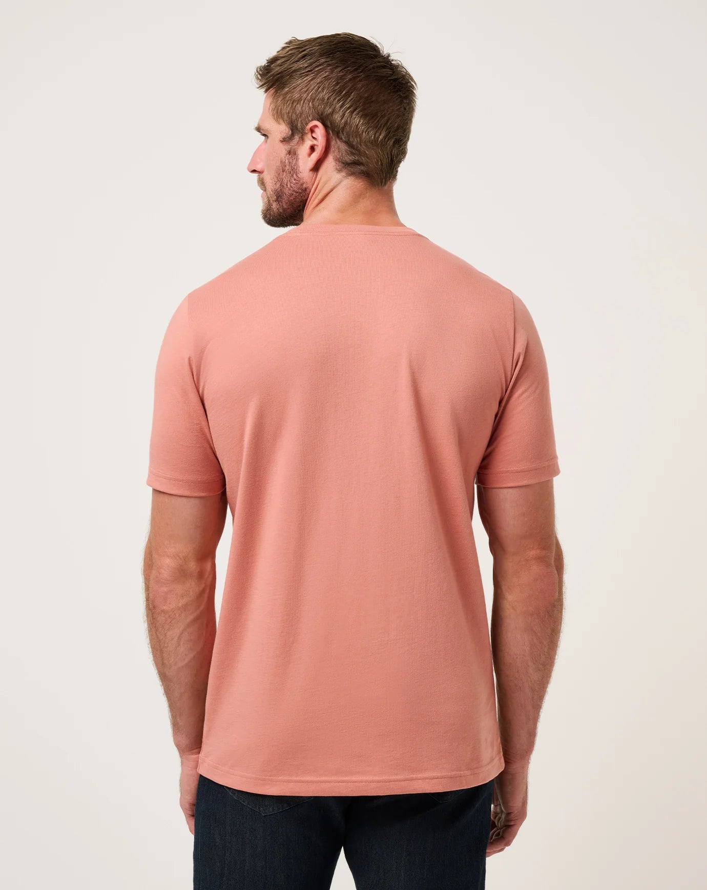 back view of TravisMathew Top Places Solid Tee