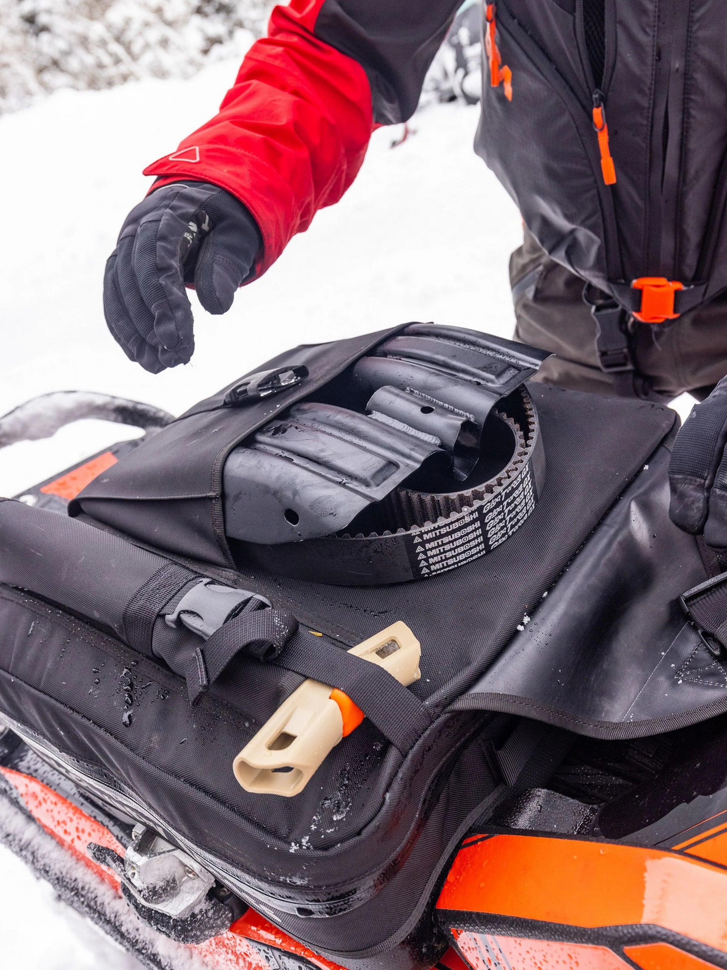 packing away the BCA Dozer™ 2T-S Avalanche Shovel into a pack