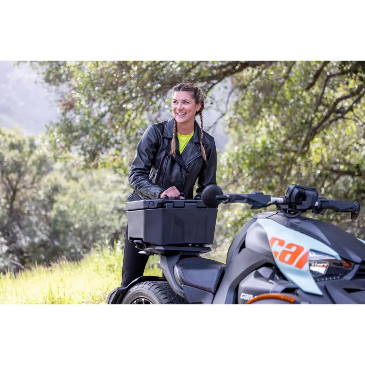 a woman using the Can-Am LinQ Rigid Cooler