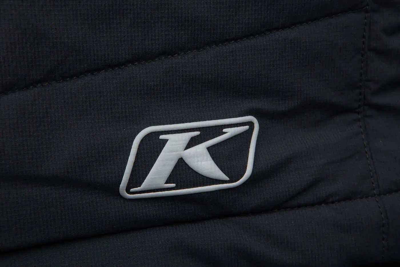 Close-up of a black Klim Override Jacket