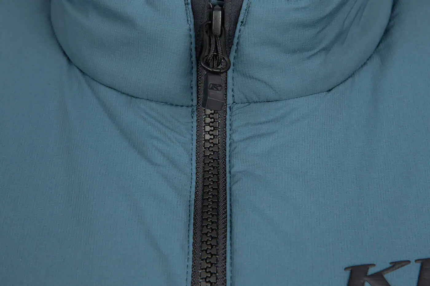 Close-up of a blue Klim Override Jacket