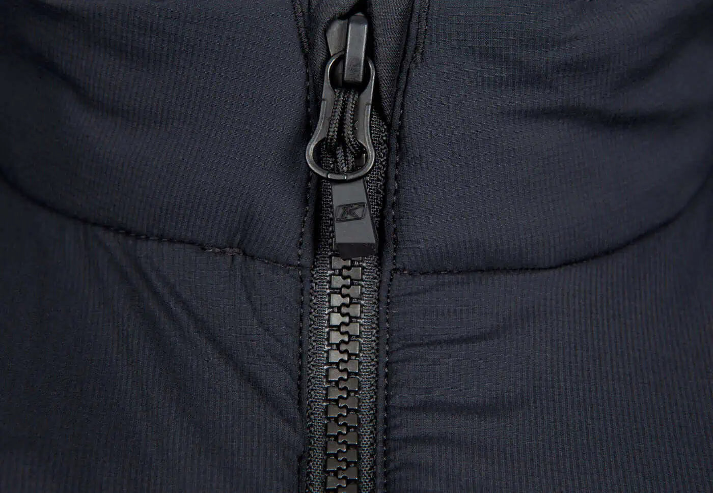 Close-up of a black zipper on a Klim Men's Override Vest