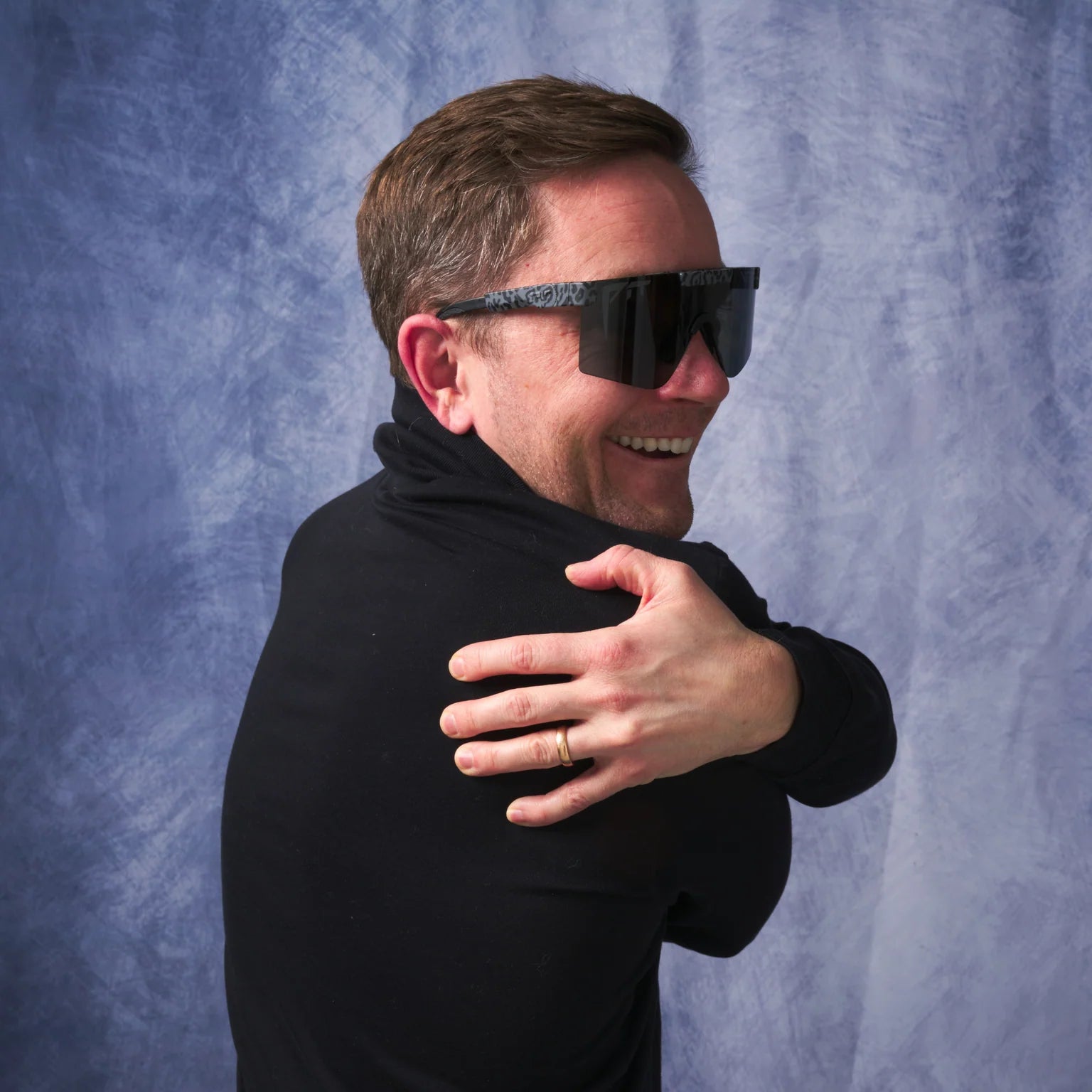 model wearing the Pit Viper The Original 2.0 Sunglasses - The Firecracker (Wide)