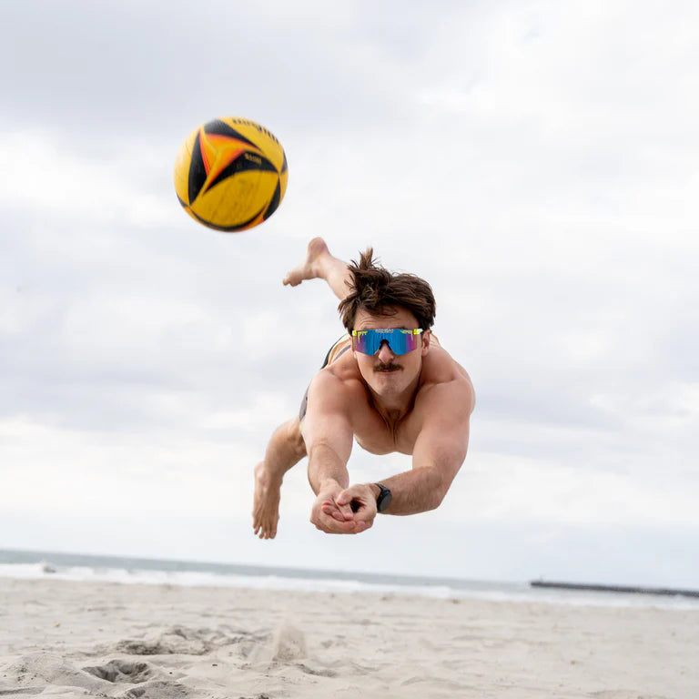 wearing the Pit Viper The Original 2.0 Sunglasses - The Rec Beach (Wide) while playing beach volleyball!
