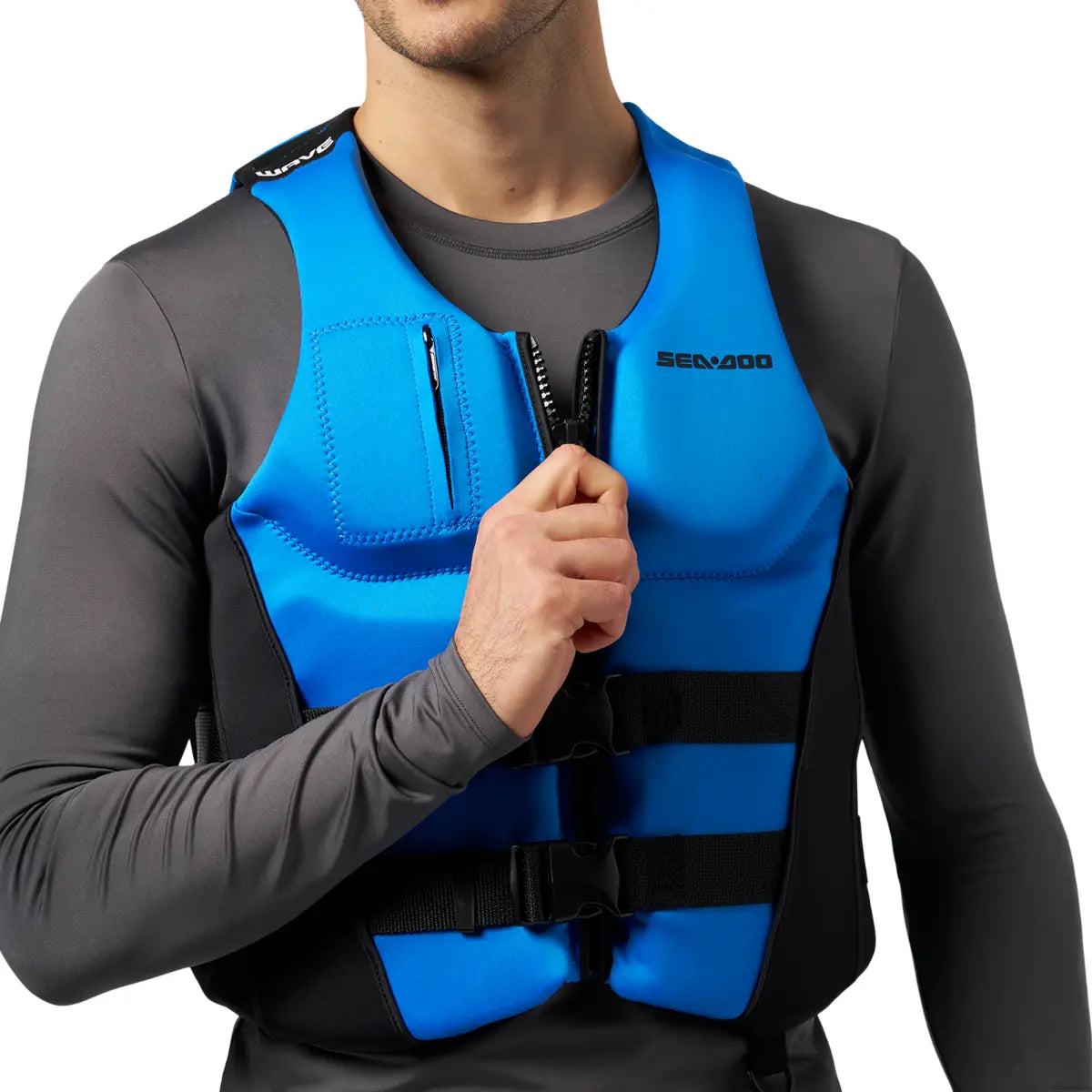 man pulling the zipper on the blue Sea-Doo Wave Unisex Life Jacket / PFD