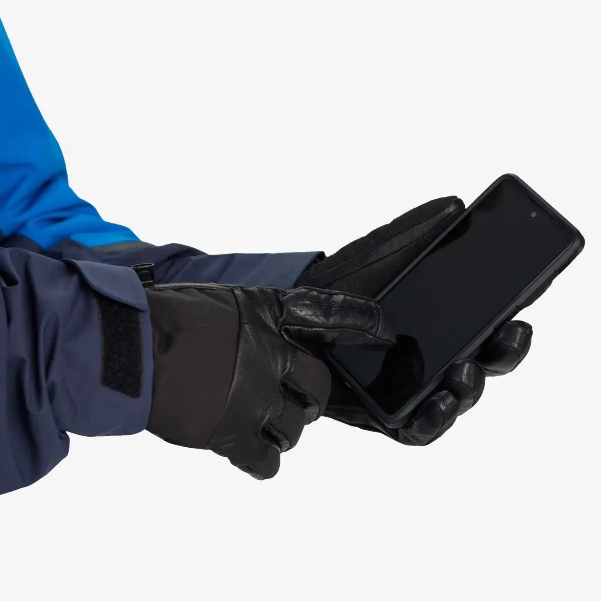 a person is holding a cell phone, wearing the Ski-Doo BC Aspect Short Gloves