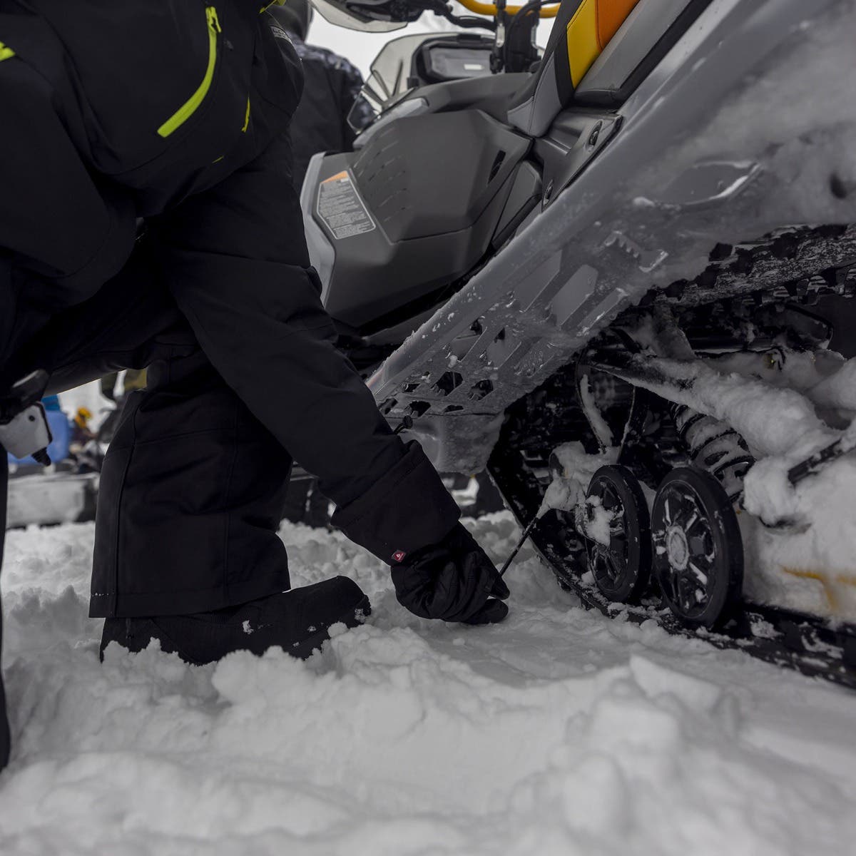 using Ski-Doo Rail Ice Scratchers 