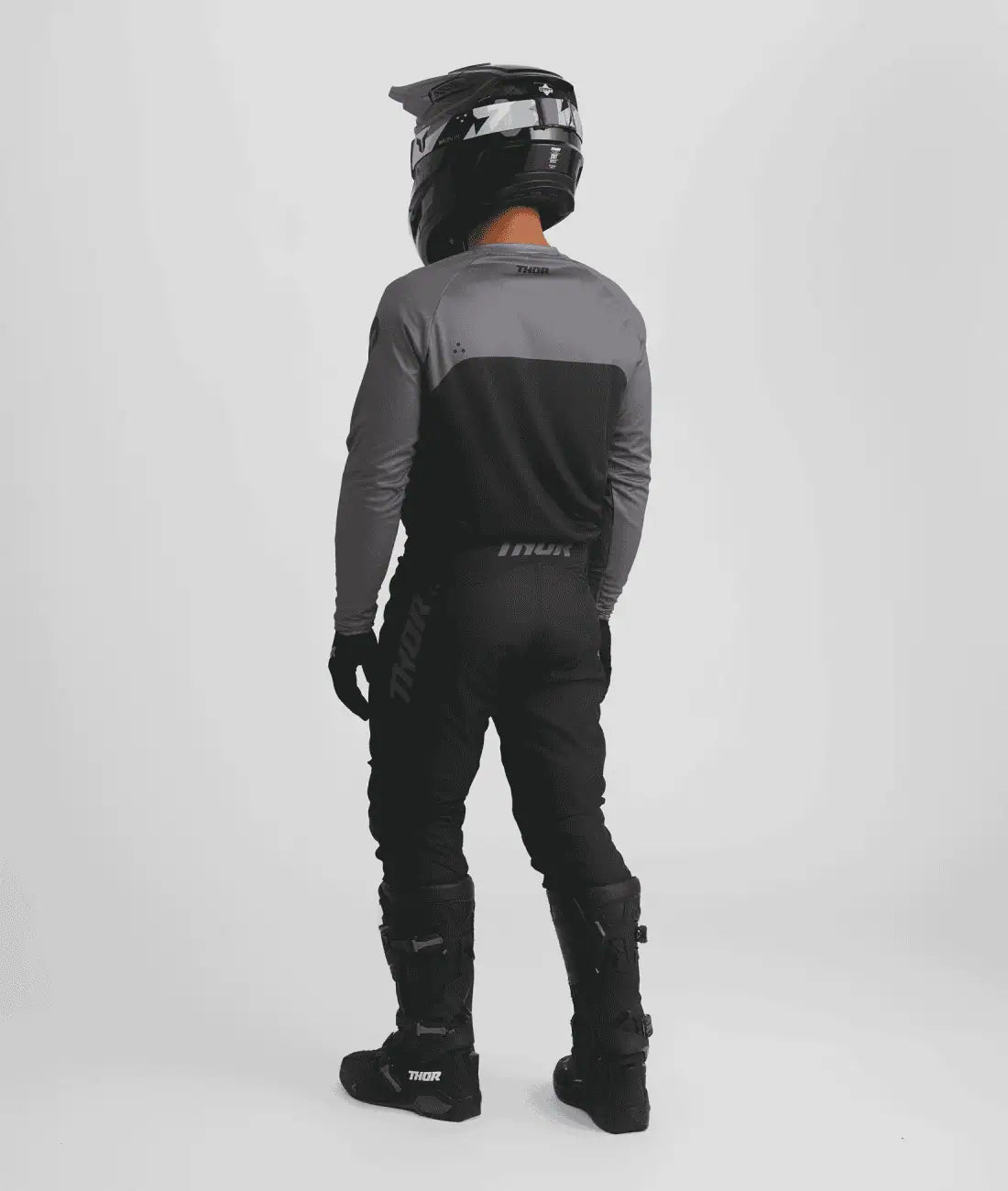 model wearing black Thor Ridemode Menace Riding Pants