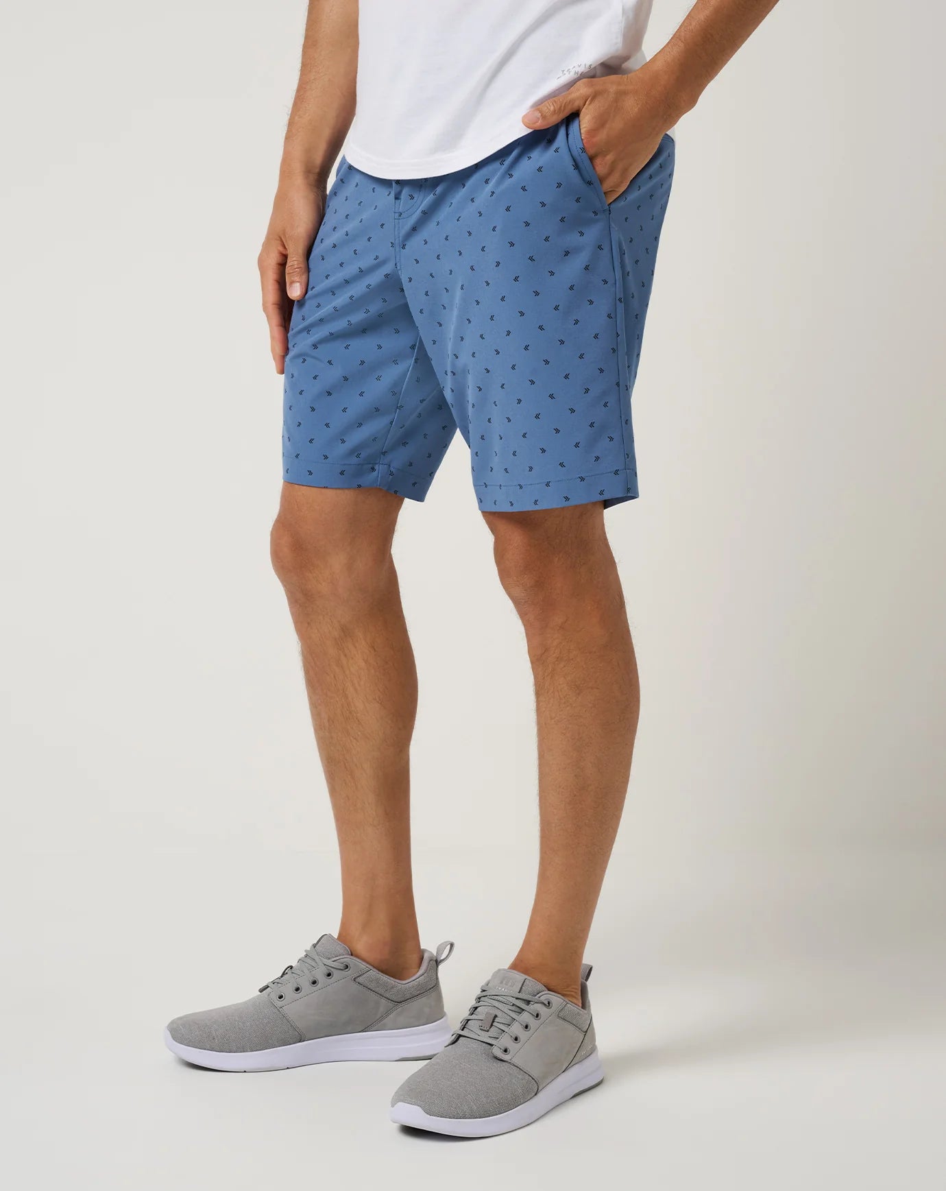 side view of the blue horizon geo print of the TravisMathew Beck Print Shorts